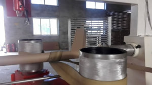 Spiral tube making machine rolling